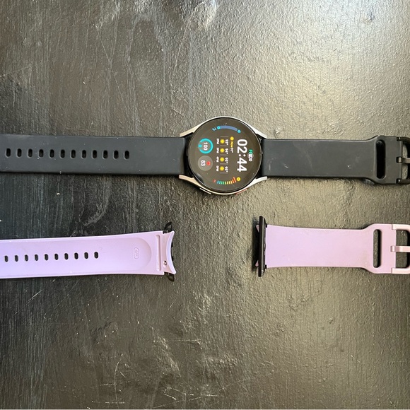 Smartwatch with Interchangeable Black and Purple Bands